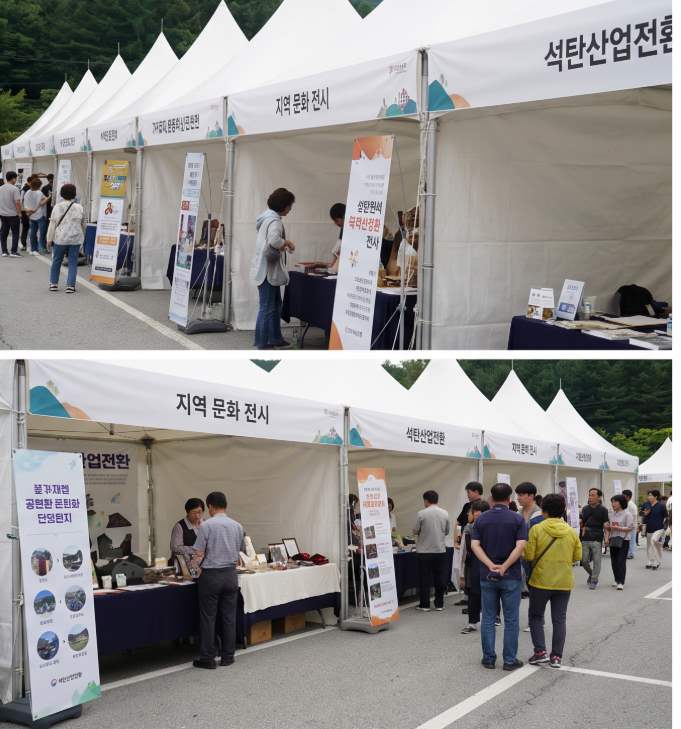 Flea market stalls and miner food booths along 650 Street at the Coal Heritage Festival 2026 in Sabuk